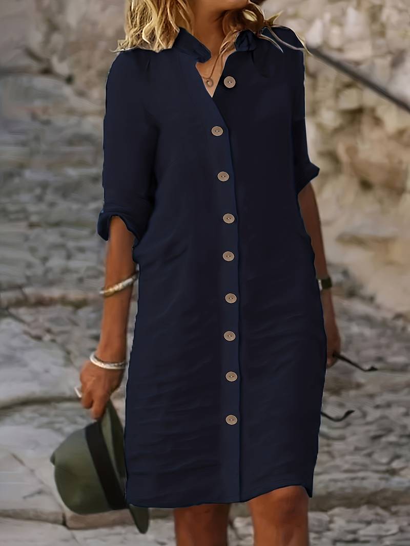 Robe midi élégante femme, coupe fluide pour un style chic et intemporel. Parfaite pour une tenue d'été confortable.