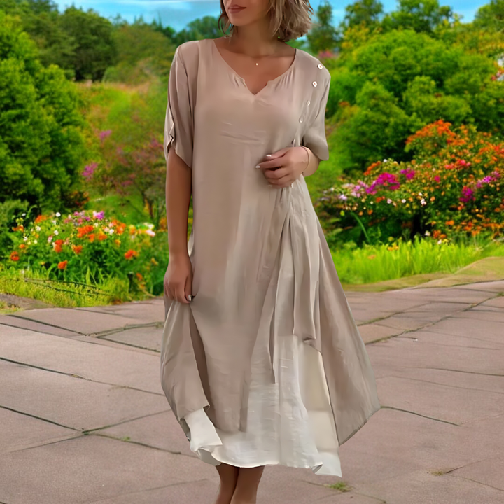 Robe d'été fluide et légère pour femme, style décontracté et élégant, parfaite pour la chaleur estivale et le confort.