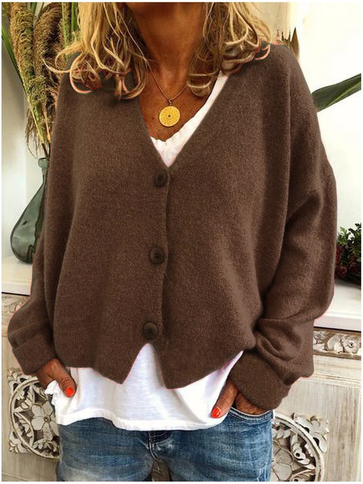 Cardigan femme chic, pièce maîtresse de superposition, rehausse votre tenue avec confort et raffinement.