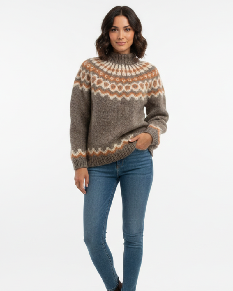 Pull islandais femme ample avec motif nordique traditionnel. Idéal pour un hiver chaud et stylé.