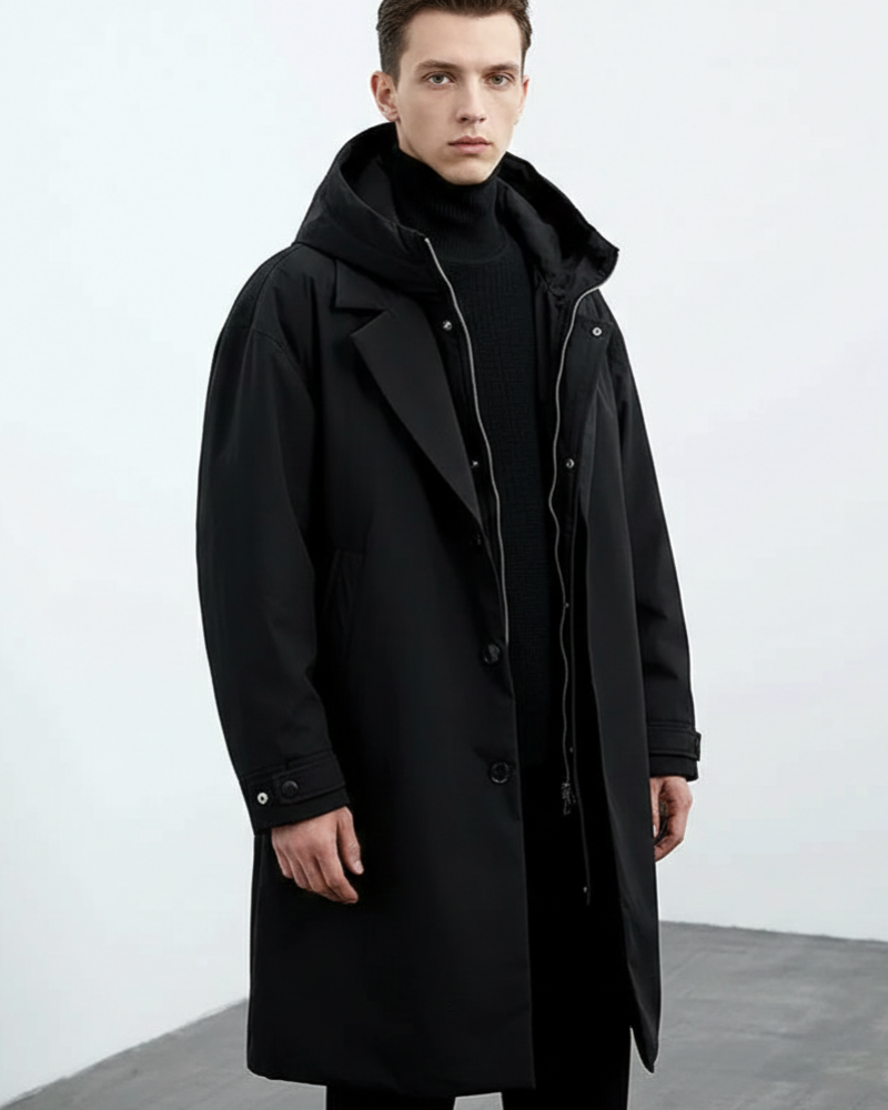Manteau trench homme long élégant, imperméable et chaud pour l'hiver. Vêtement masculin style chic avec capuche.