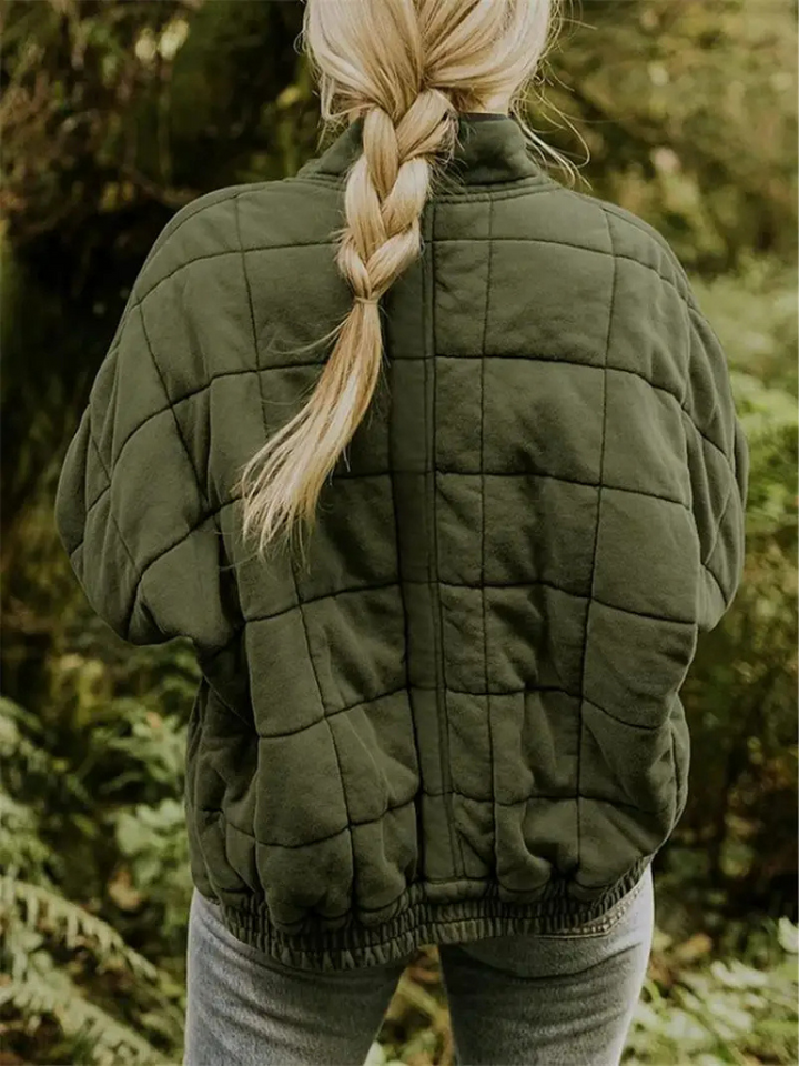 Blouson femme matelassé, élégance urbaine, parfait pour affronter l'hiver.