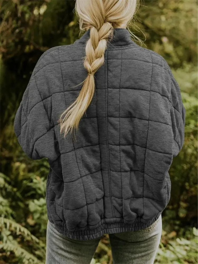 Blouson femme matelassé tendance, style urbain décontracté, idéal automne hiver.
