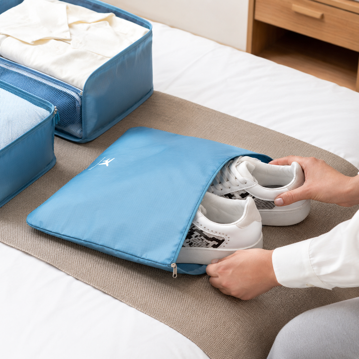 Optimisez l'espace de votre valise avec ces sacs de rangement de voyage, essentiels pour le rangement de vêtements.