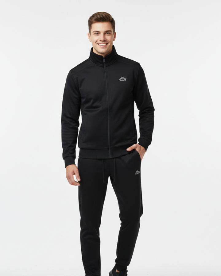 Survêtement homme athlétique avec veste à fermeture éclair et pantalon assorti, idéal pour le sport ou le confort.