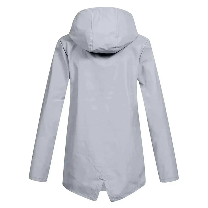 Manteau de pluie long femme, design élégant, garde au sec avec style, vêtement de pluie chic.
