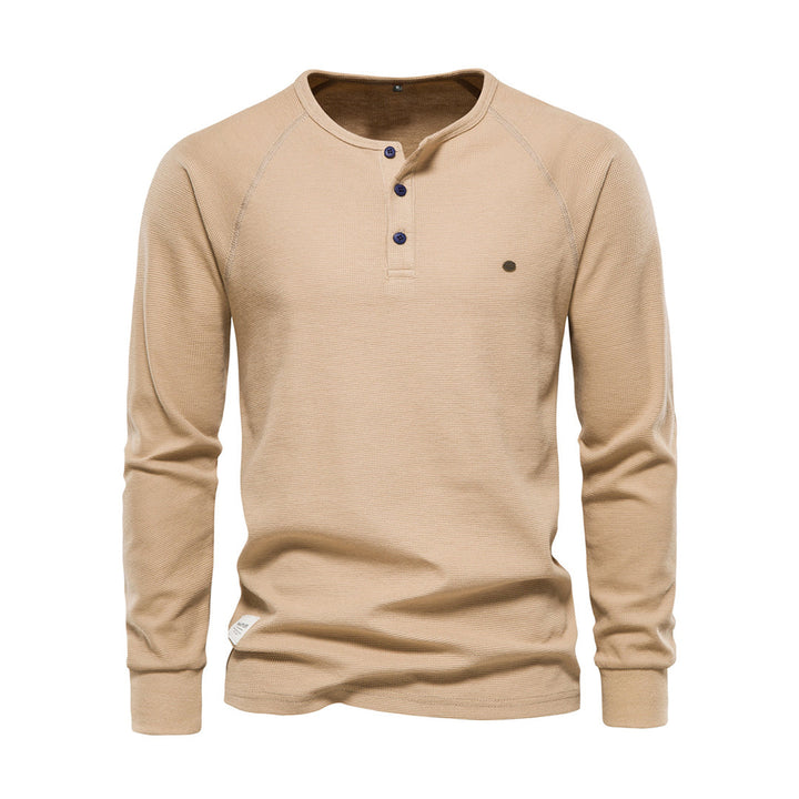 T-shirt Henley homme casual, manches longues, col boutonné. Confort et style masculin polyvalent pour toute occasion.