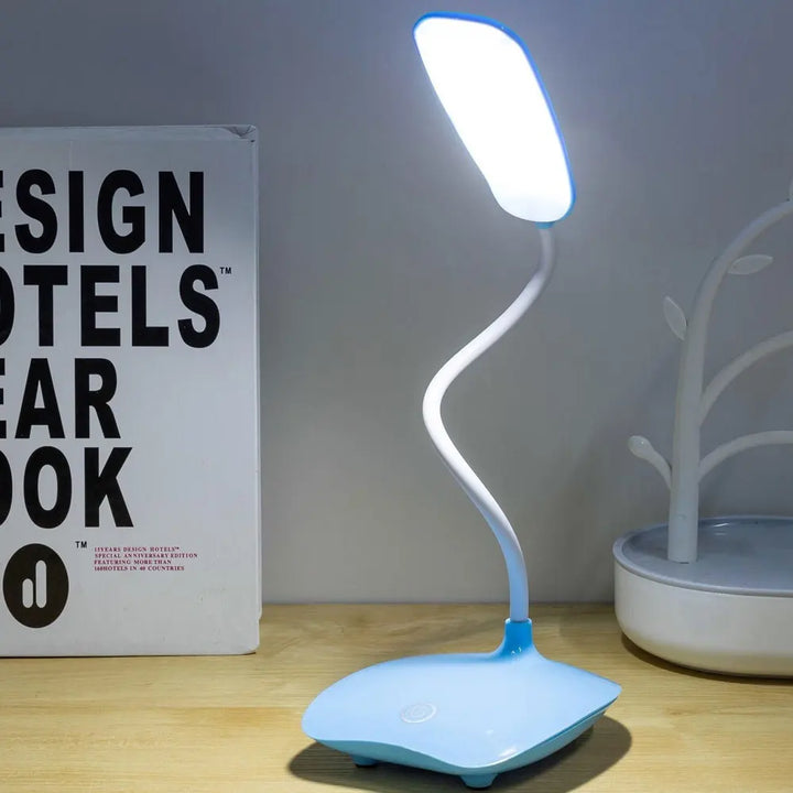 Lampe de table LED éco-énergétique, pliable, sans fil, avec chargeur intégré. Idéale pour tout intérieur.