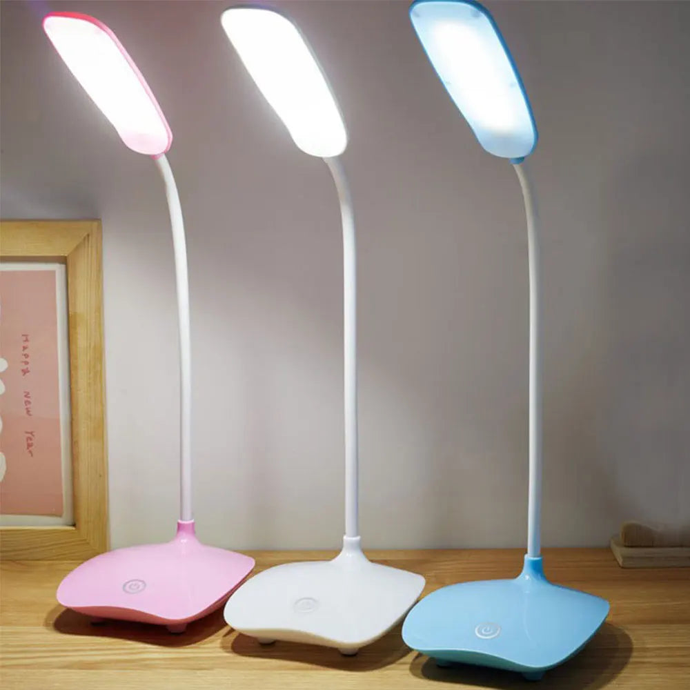 Lampe de table LED pliante, design moderne, éclairage réglable et charge sans fil. Décoration intérieure élégante.