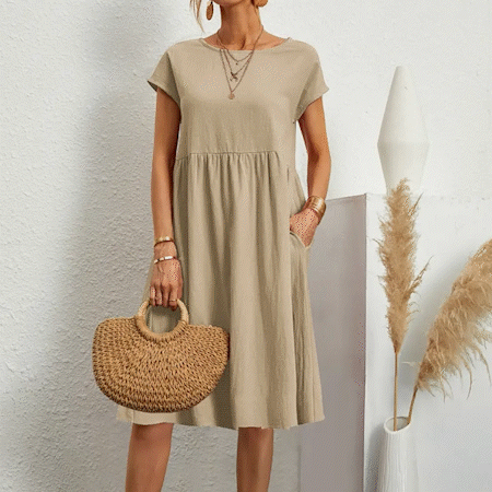 Robe d'été femme décontractée, coupe empire. Parfaite pour la plage ou les sorties, légère et avec poches.