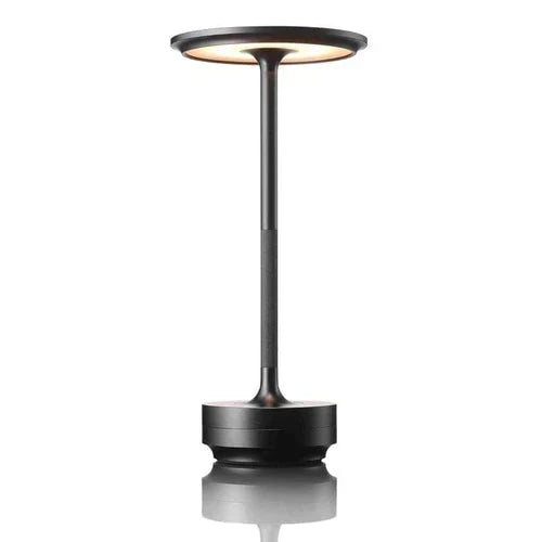 Élégante lampe de table sans fil LED dimmable noire. Éclairage moderne rechargeable pour terrasse ou salon.