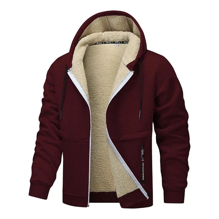 Veste urbaine homme avec capuche intégrée, alliant chaleur et look décontracté. Essentielle pour le froid.