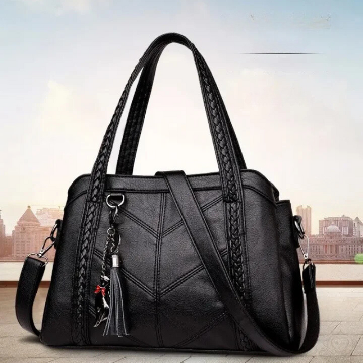 Sac à main femme spacieux en cuir PU avec multiples compartiments, design élégant et moderne.