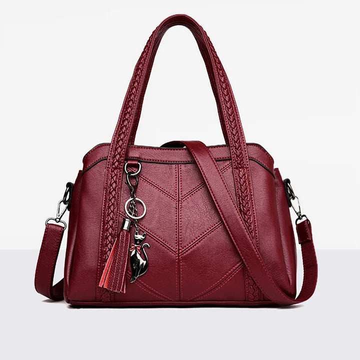 Sac femme en cuir PU avec bandoulière ajustable, parfait pour un look quotidien chic et organisé.