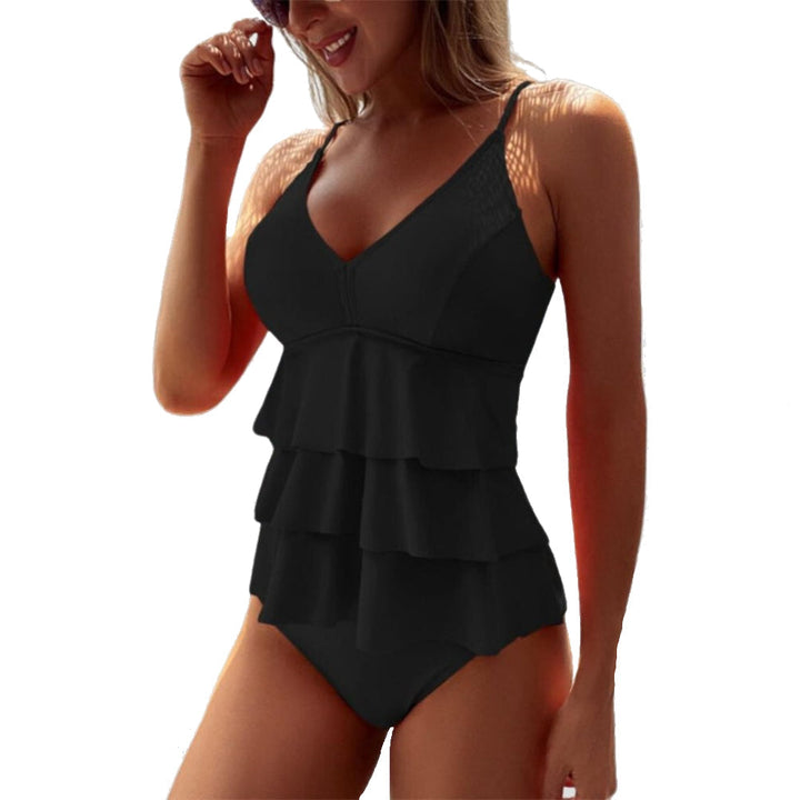 Maillot de bain femme à volants pour l'été. Élégant, idéal pour la plage, piscine ou vacances ensoleillées.