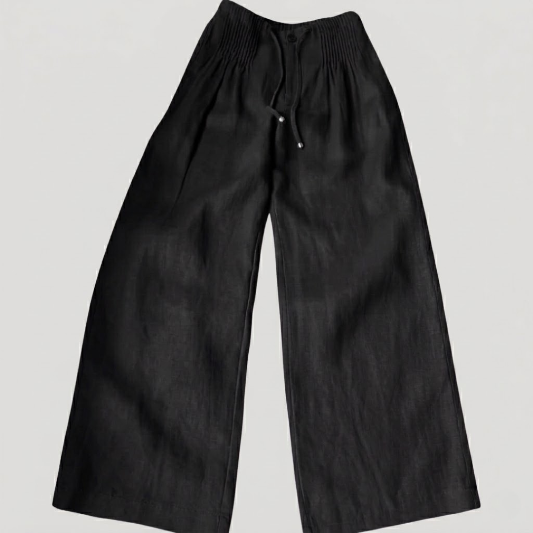 Léger pantalon ample femme en coton respirant, taille élastique, idéal pour le confort quotidien.