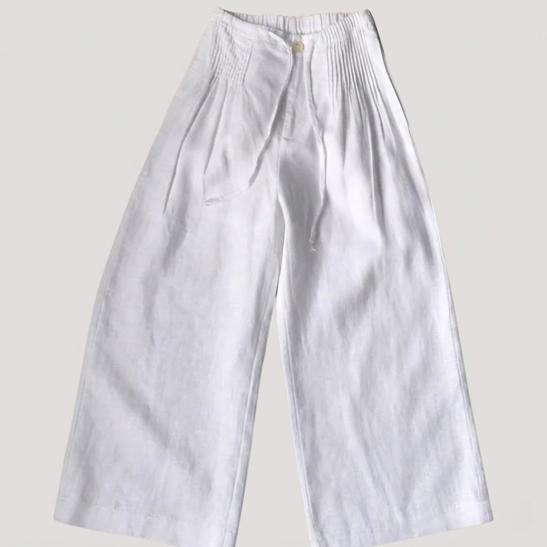 Pantalon fluide femme en coton doux, taille élastique confortable, coupe ample et respirante.