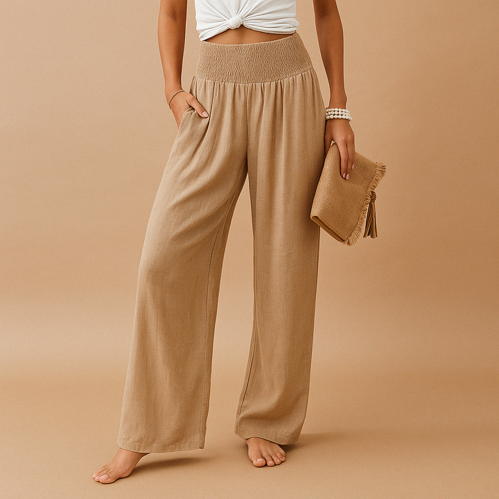 Pantalon femme taille haute en lin fluide, coupe décontractée chic pour confort et élégance.
