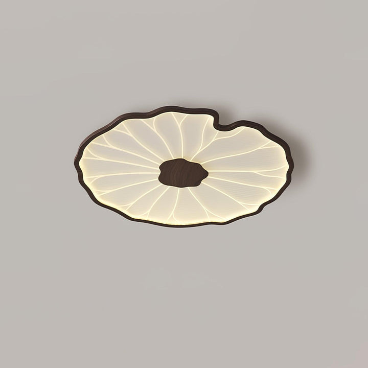 Plafonnier LED Solara, motif feuille de lotus, bois noyer, création ambiance chaleureuse salon.