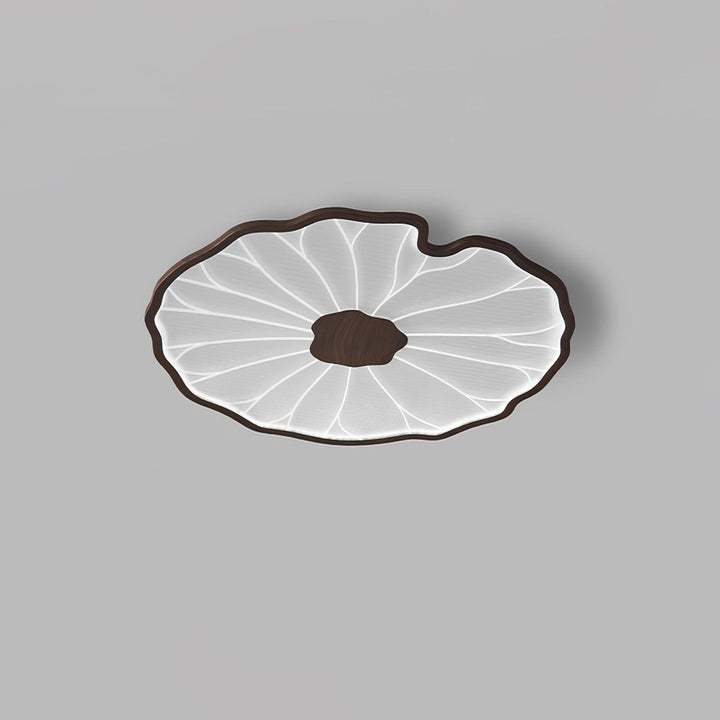 Plafonnier LED Solara, motif feuille de lotus, bois naturel, idéal pour ambiance salon ou chambre.