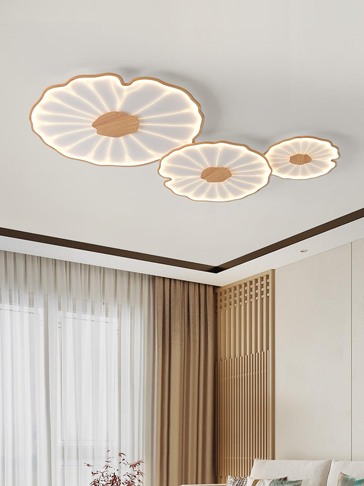 Plafonnier LED Solara, design feuille de lotus original, bois naturel, éclaire votre espace.