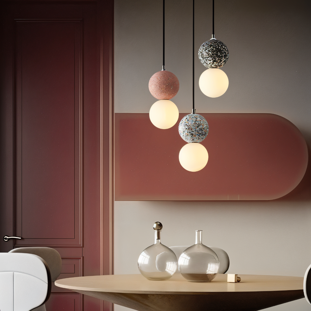 LumeGlobe double boule, suspension en verre pour un éclairage de table à manger moderne.
