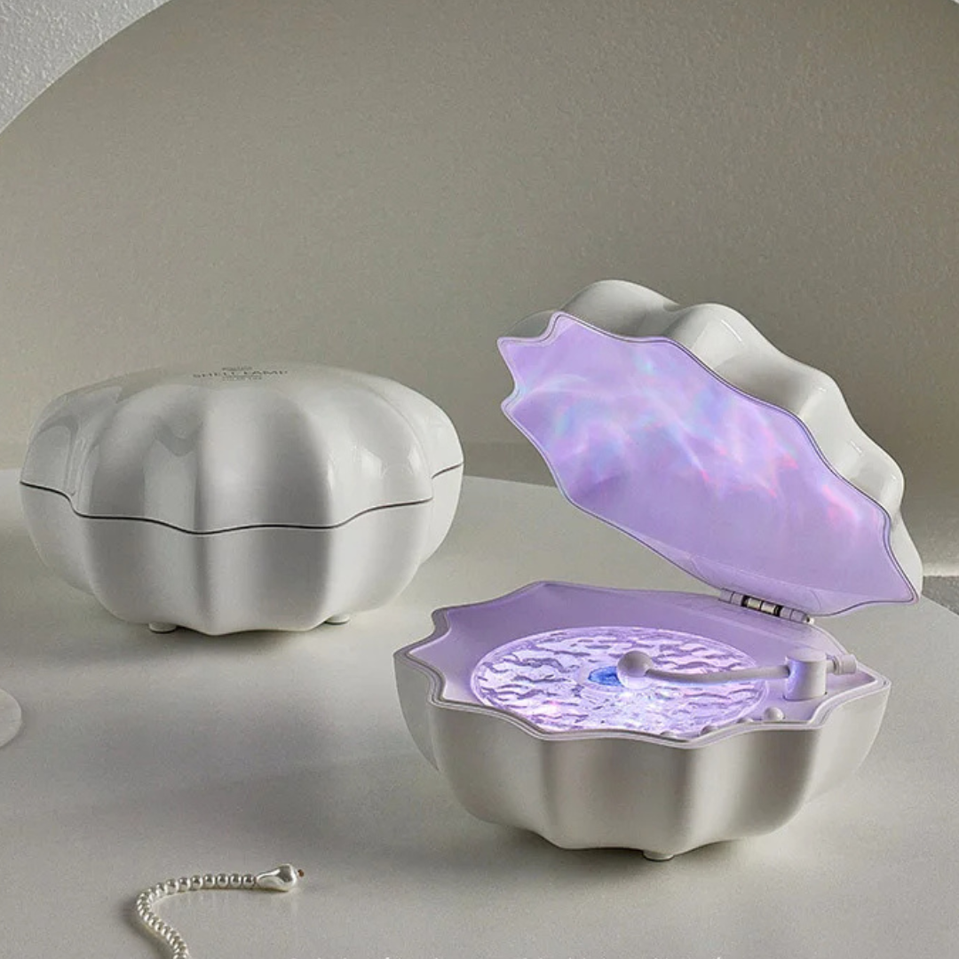 Haut-parleur Bluetooth Lumière Vagues; offre une ambiance marine immersive pour la détente et l'écoute.