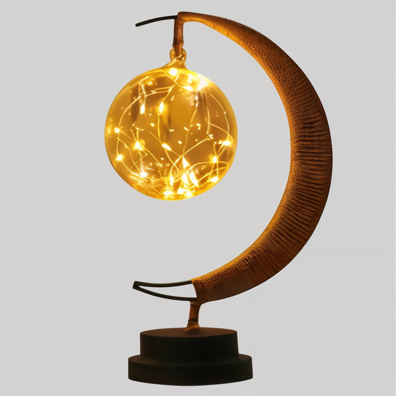 Veilleuse LED LunaSphere design unique effet lune 3D, parfaite pour la chambre d'enfant.