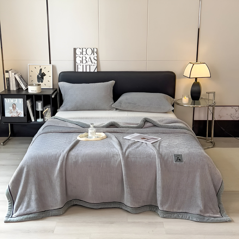 Couverture décorative en velours, ajoute chaleur et élégance à votre salon cosy.