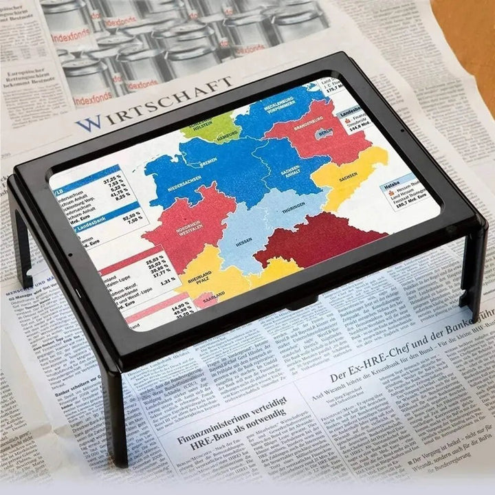 Loupe de lecture avec triple grossissement, pliable, éclairage LED intégré pour un confort visuel.