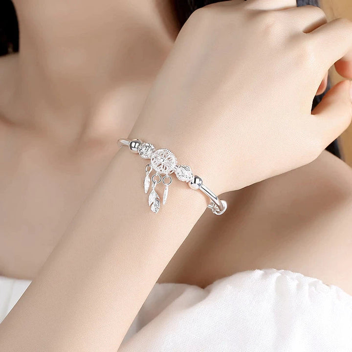 Magnifique bracelet en argent 925 pour femme, design attrape-rêves, ajustable et tendance.