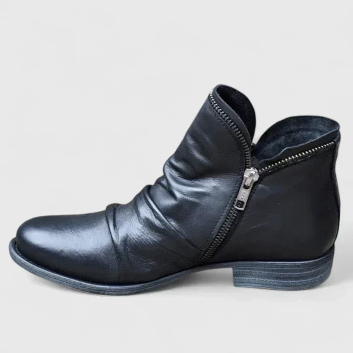 Chaussures bottines élégantes pour femme, froncées à la cheville, avec zip devant, idéales mode automne-hiver.