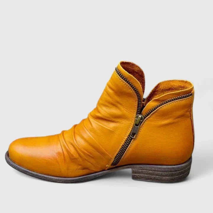 Bottines confort femme froncées à zip devant. Chaussures élégantes pour le quotidien, style hiver.