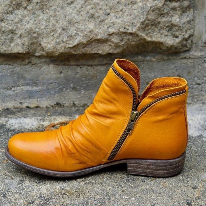 Bottines femme confortables avec fermeture éclair, orthopédiques pour un excellent soutien du pied, style élégant.