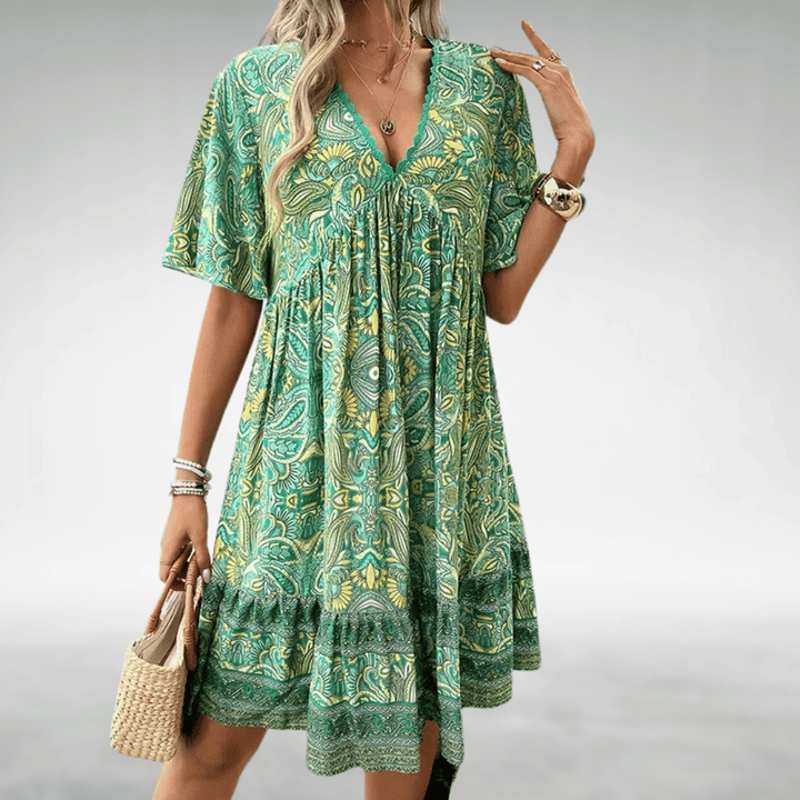 Robe bohème fluide femme, imprimé estival décontracté, coupe trapèze chic pour l'été.