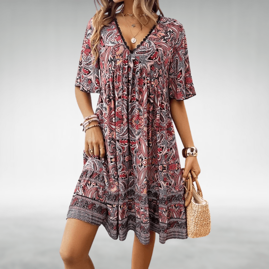 Robe trapèze bohème femme avec imprimé floral coloré, silhouette fluide et confortable mode estivale.