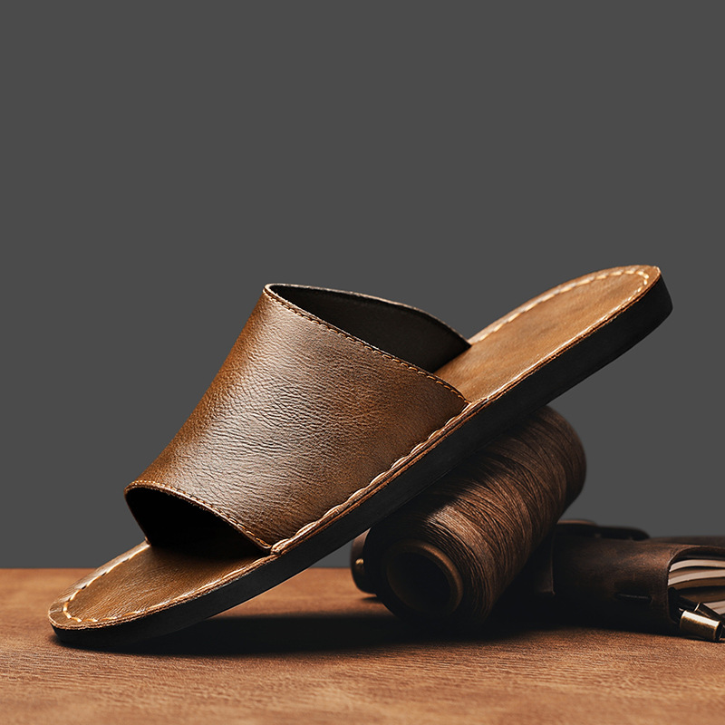 Mules croisées élégantes pour hommes, noires, confort estival léger, parfaites pour un style décontracté.