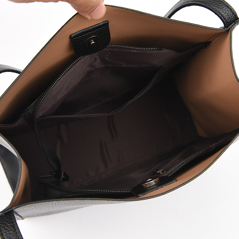 Sac à main femme en cuir PU, design épuré, élégance et fonctionnalité pour le quotidien.