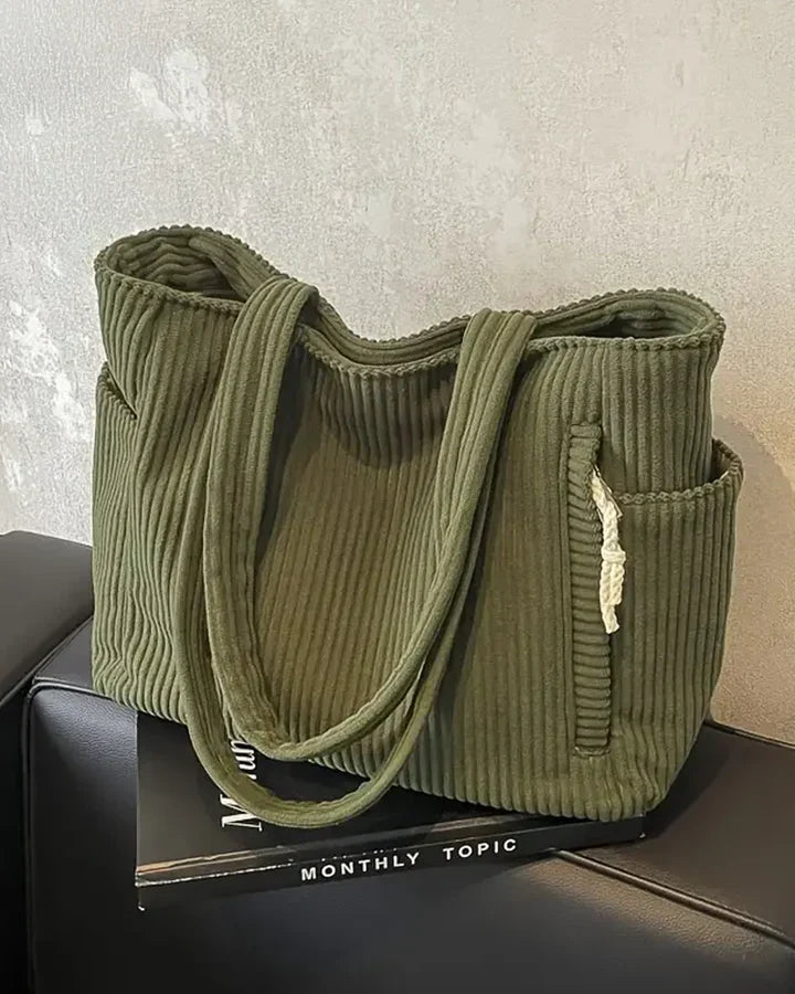 Sac cabas femme côtelé moderne, parfait pour le travail. Grand rangement, style élégant et fonctionnel.