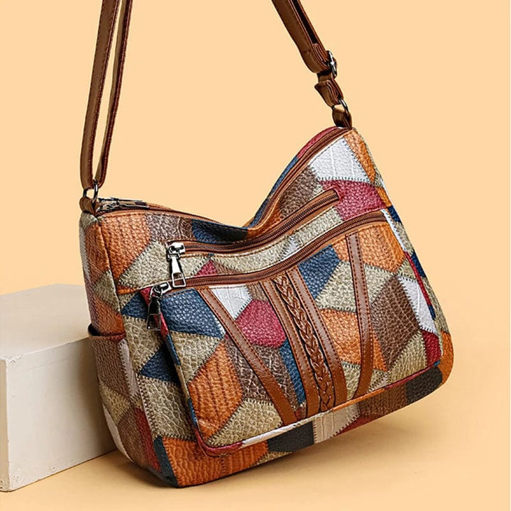 Sac à main femme marron en cuir véritable, avec motif mosaïque original et multiples rangements.