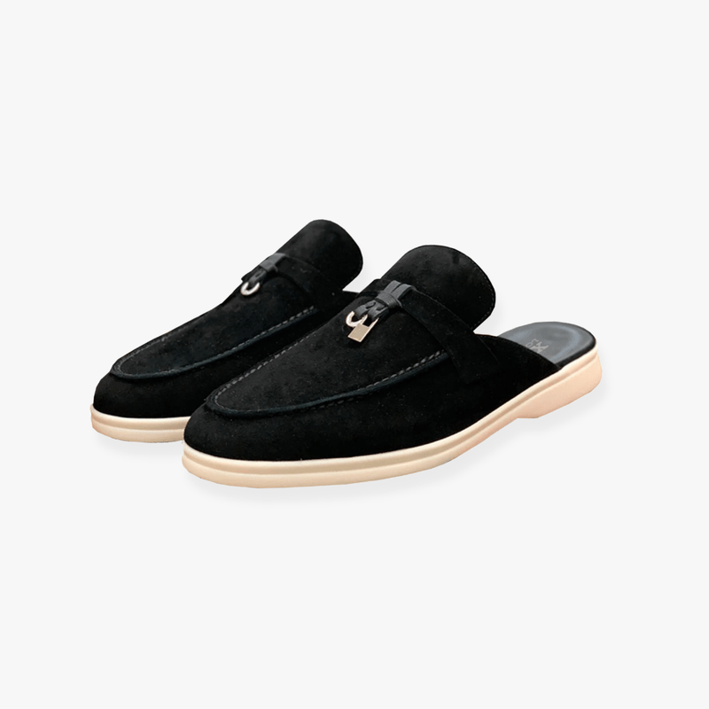 Mules élégantes et confortables pour femme, sans talon, à enfiler, avec une jolie boucle.