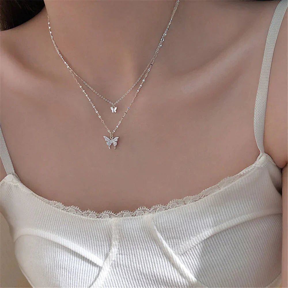 Collier femme papillon zircon brillant. Double chaîne argent hypoallergénique, bijou élégant et parfait cadeau.