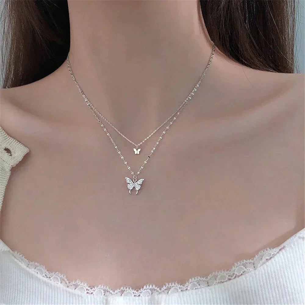 Collier élégant femme papillon argent avec zircon éclatant. Bijou mode double chaîne pour un style raffiné.
