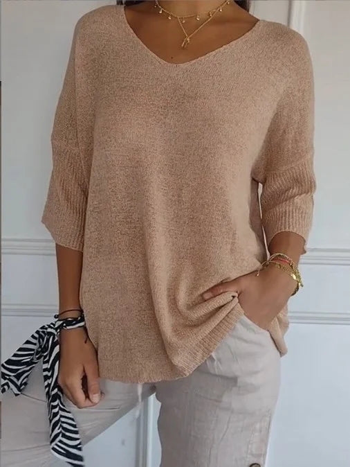 Pull femme col V, un incontournable léger. Apporte confort et élégance à votre garde-robe mode.