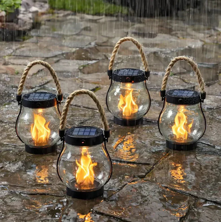 Lanterne solaire automatique et résistante aux intempéries, avec effet flamme LED pour un jardin élégant.