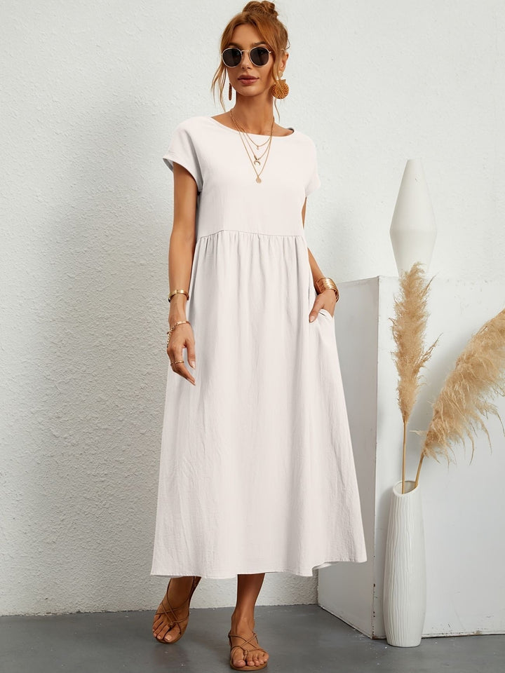 Robe Mathilda, essentielle pour l'été, confort et élégance féminine.