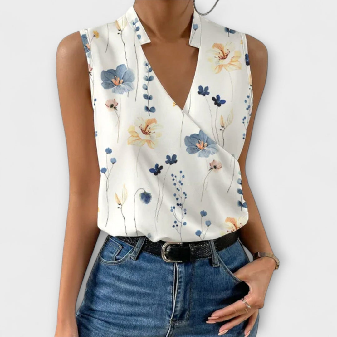 Vêtement femme col V. Blouse élégante, top confortable et chic. Idéal pour un look estival décontracté.