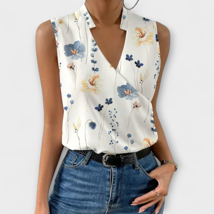 Vêtement femme col V. Blouse élégante, top confortable et chic. Idéal pour un look estival décontracté.