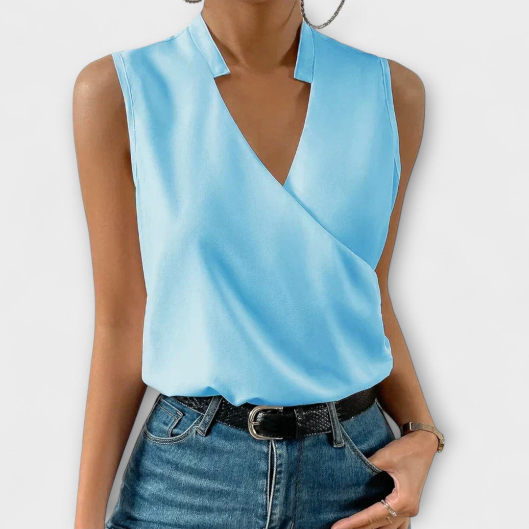 Blouse femme col V couleur unie, chic. Haut confortable, mode féminine décontractée parfaite pour l'été.