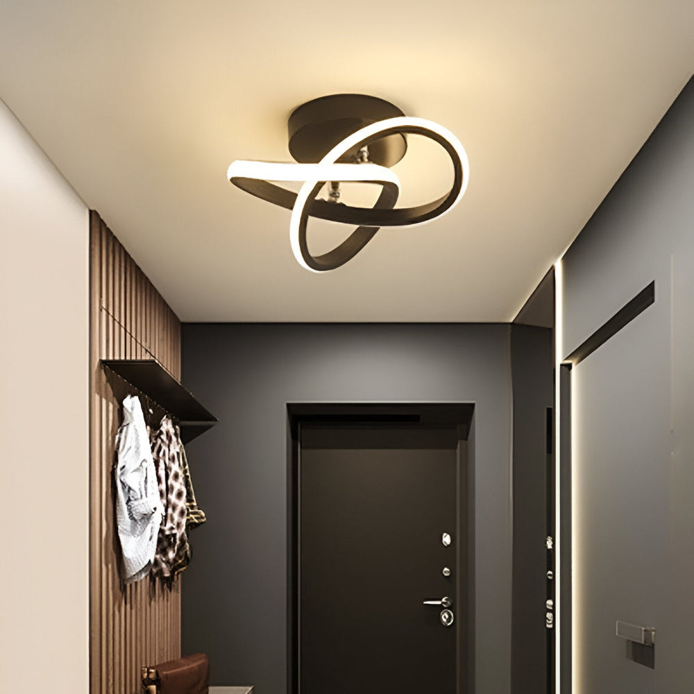 Plafonnier LED moderne abstrait dimmable Ø24 cm pour salon design.